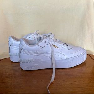 Women’s White Puma Carina Sneakers in White/Gold
